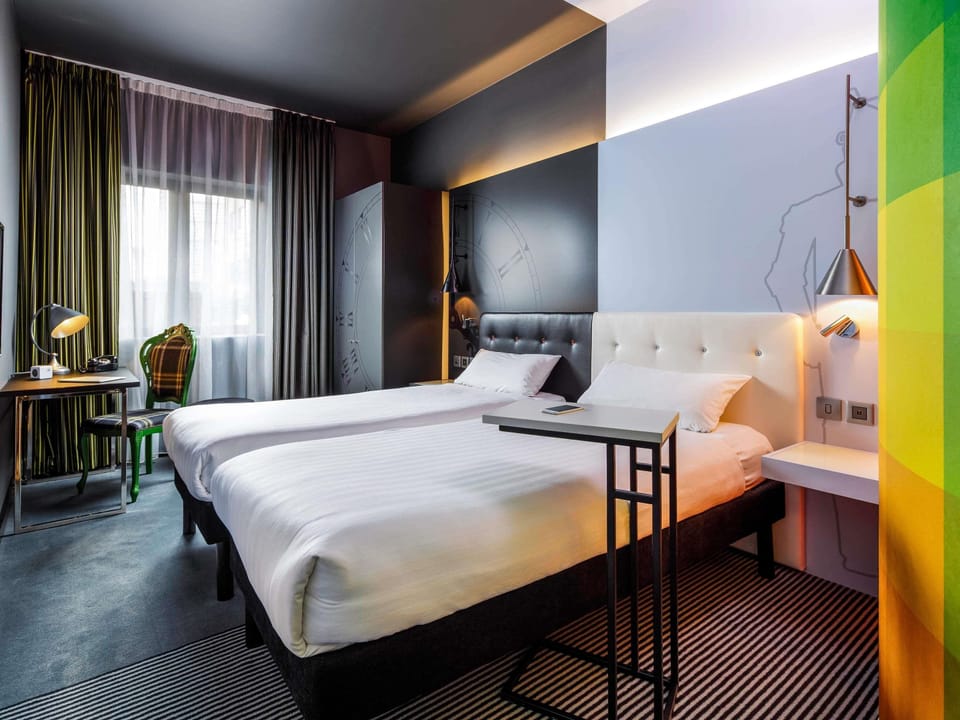 Classic Twin Room | In-room safe, individually decorated, desk, laptop workspace