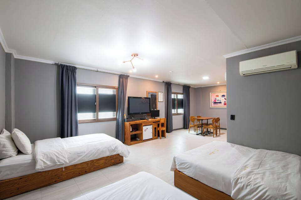 Family Room, City View | Desk, laptop workspace, blackout drapes, soundproofing