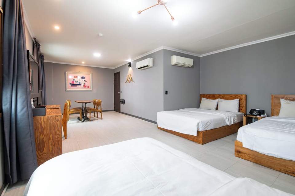 Family Room, City View | Desk, laptop workspace, blackout drapes, soundproofing