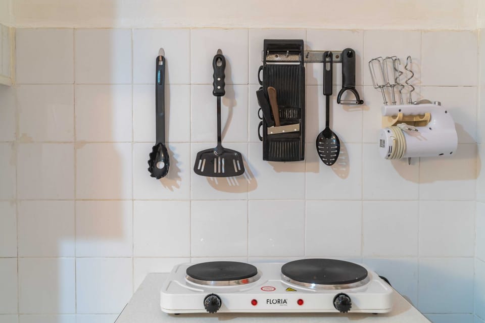 Apartment (One-Bedroom Apartment) | Private kitchen | Fridge