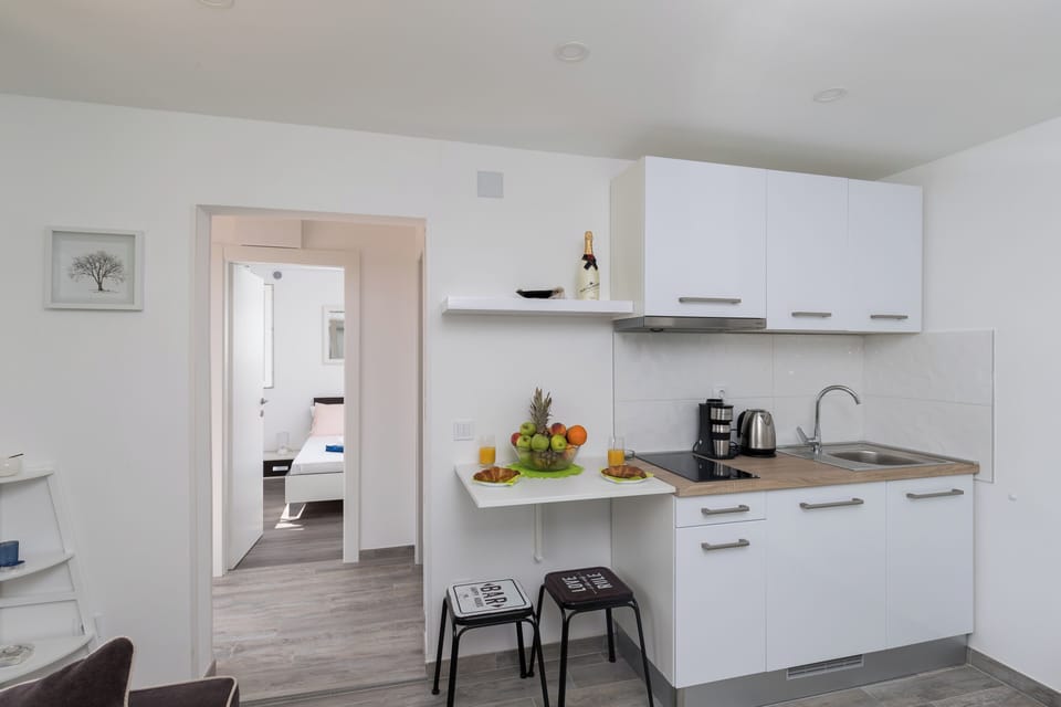 Apartment (One Bedroom Apartment with Terrace an) | Private kitchen | Fridge