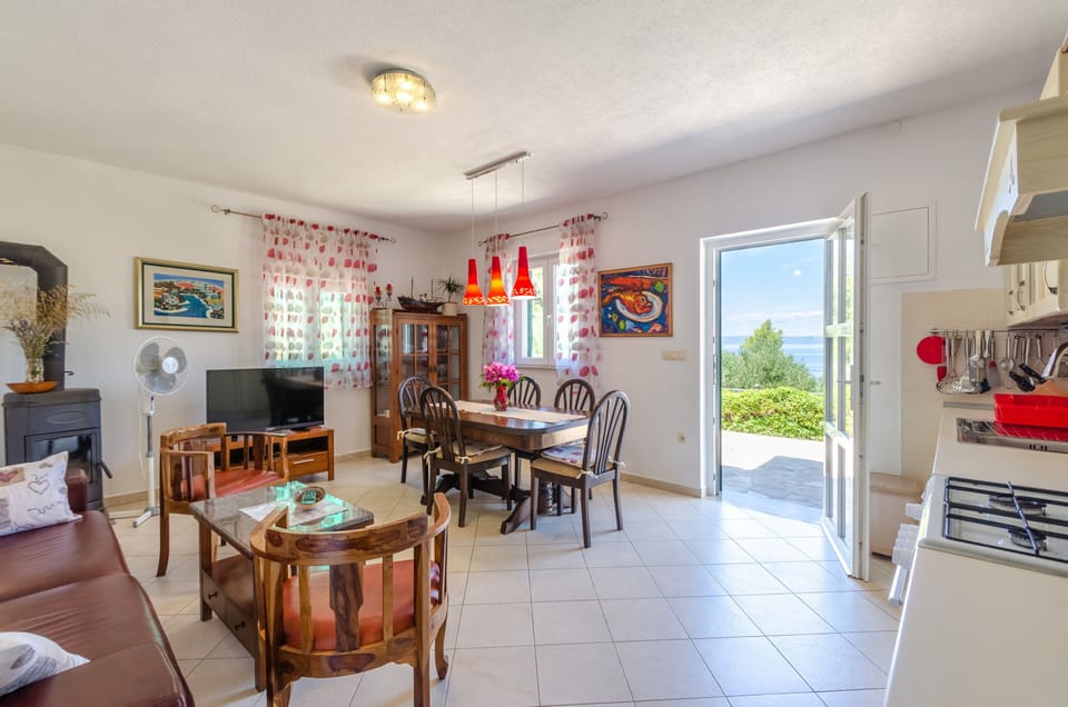 House (Two Bedroom Holiday Home with Terrace) | Living room | 32-inch flat-screen TV with cable channels