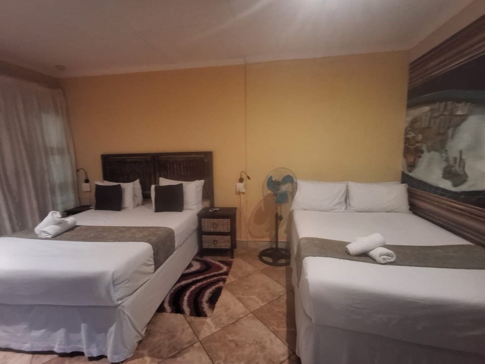 Family Quadruple Room | In-room safe, desk, iron/ironing board, free rollaway beds