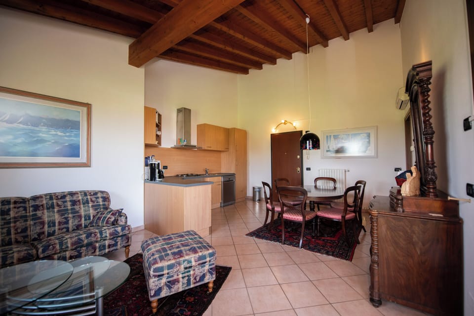 Comfort Apartment | Living area | 50-inch TV with digital channels