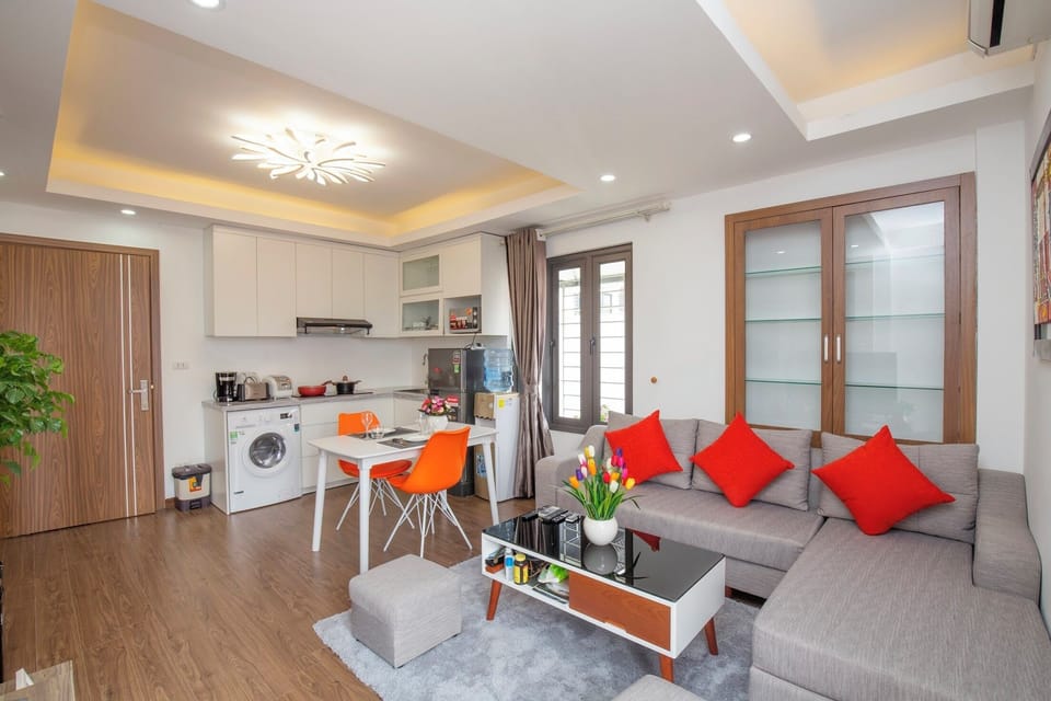 Business Apartment, Courtyard View | Living area | 55-inch TV with cable channels, fireplace, heated floors