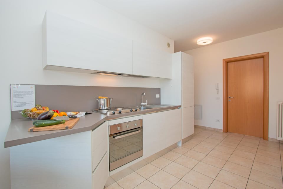 Condo, Pool View | Private kitchen | Coffee/tea maker, electric kettle, toaster, dining tables