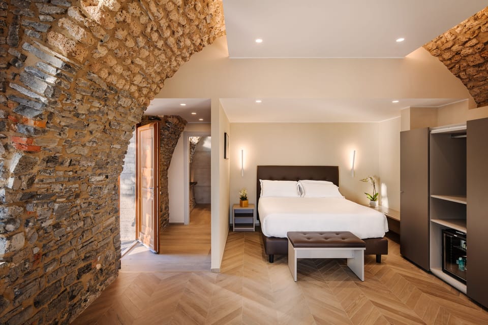 Suite, Lake View | Premium bedding, minibar, in-room safe, desk