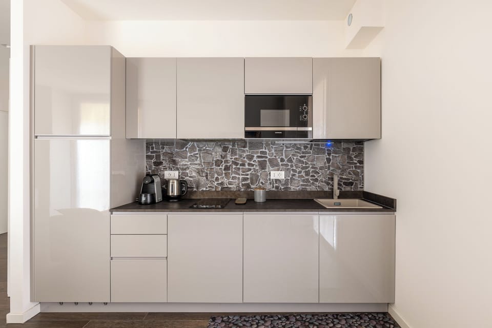 Apartment | Private kitchen | Stovetop, espresso maker, electric kettle