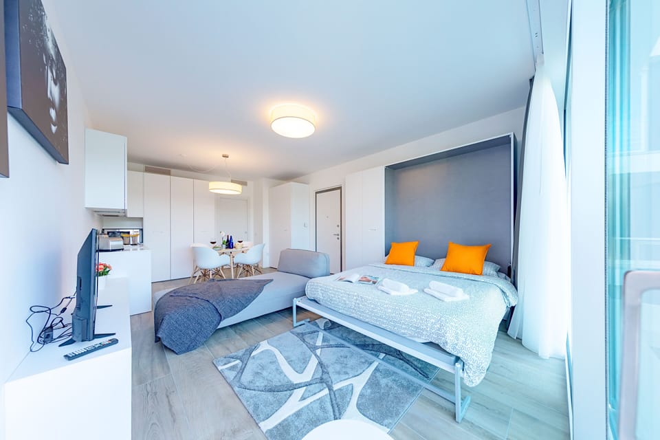 Condo, Pool View | Living room | 35-inch TV with digital channels