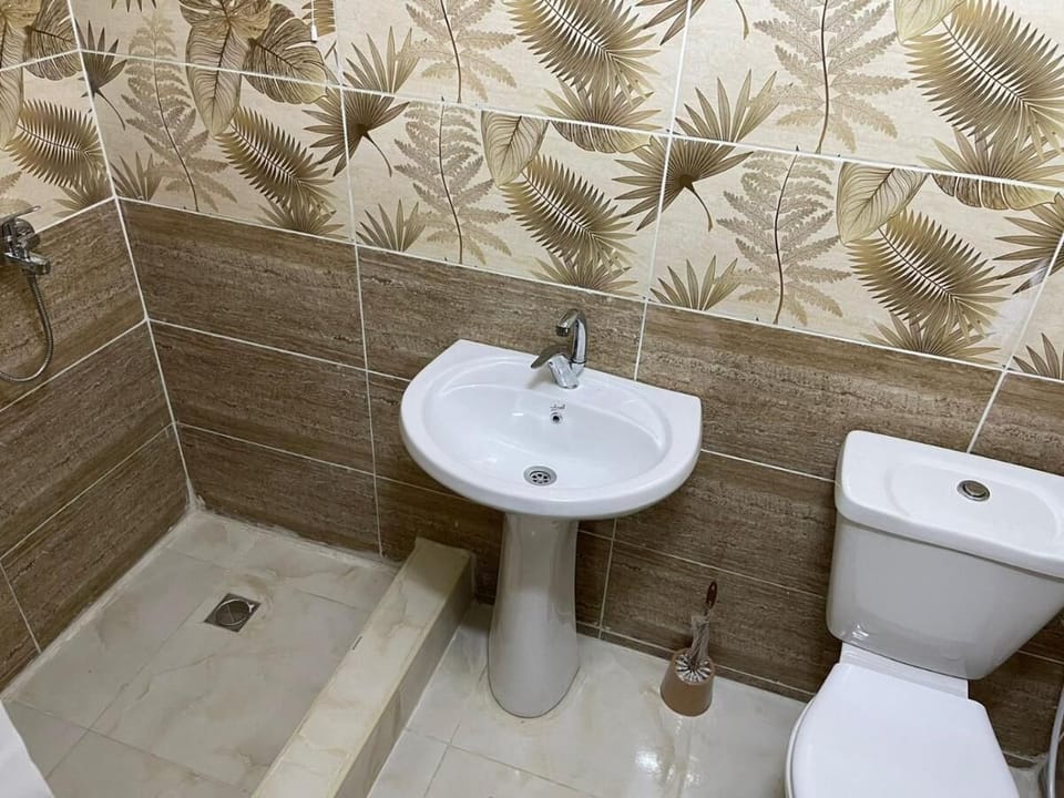 Basic Double Room, Garden View | Bathroom | Combined shower/tub, hydromassage showerhead, hair dryer, bathrobes