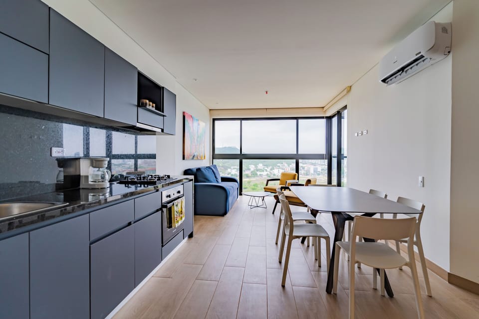 Basic Apartment | Living area | 50-inch LED TV with digital channels