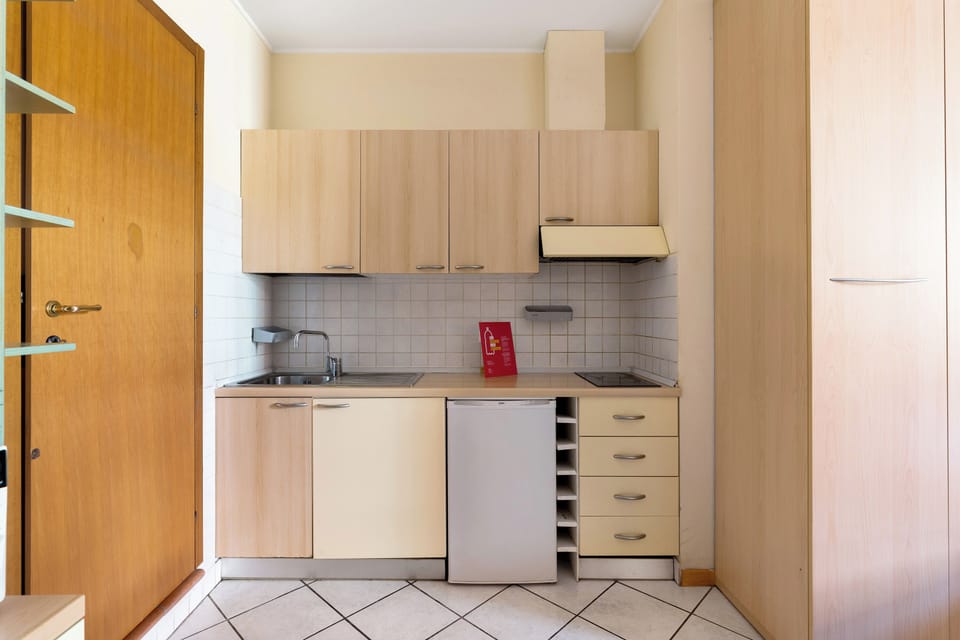 Espresso maker, electric kettle, dining tables