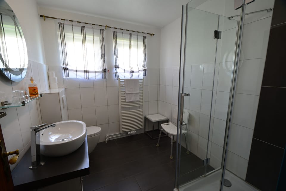 Standard Double Room | Bathroom | Shower, hair dryer, towels, soap