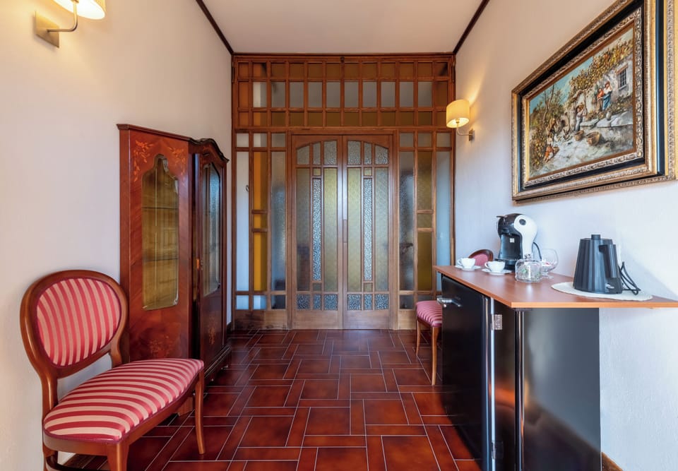 Superior Room, Pool View | Living area | 50-inch Smart TV with satellite channels, Netflix, streaming services