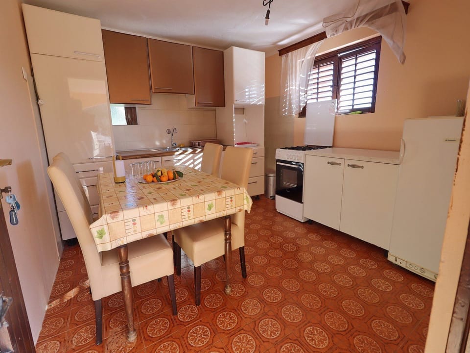 House (Four bedroom Holiday Home with Terrac) | Private kitchen | Fridge