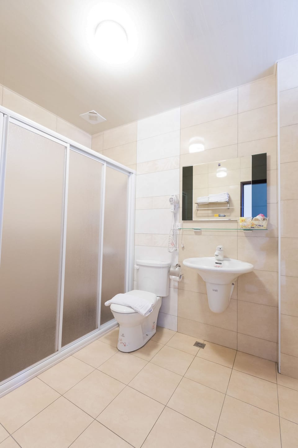 Quadruple Room, 2 Double Beds | Bathroom | Shower, free toiletries, hair dryer, slippers
