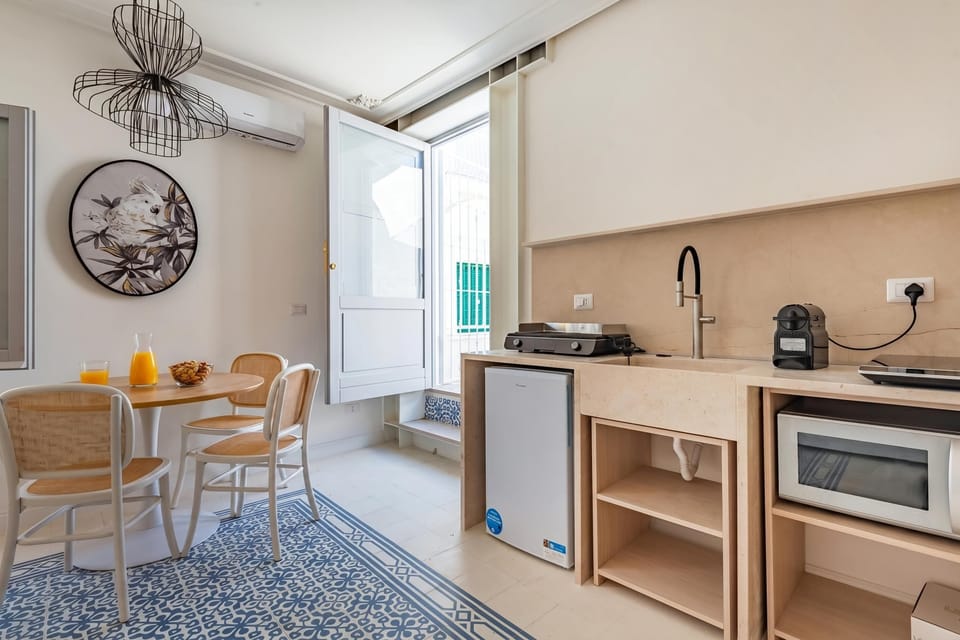 Family Apartment, Multiple Bedrooms (Dimora del Levante Monopoli) | Private kitchen | Fridge, microwave, stovetop, coffee/tea maker