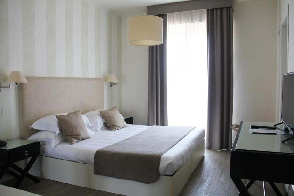 Frette Italian sheets, premium bedding, memory foam beds, minibar