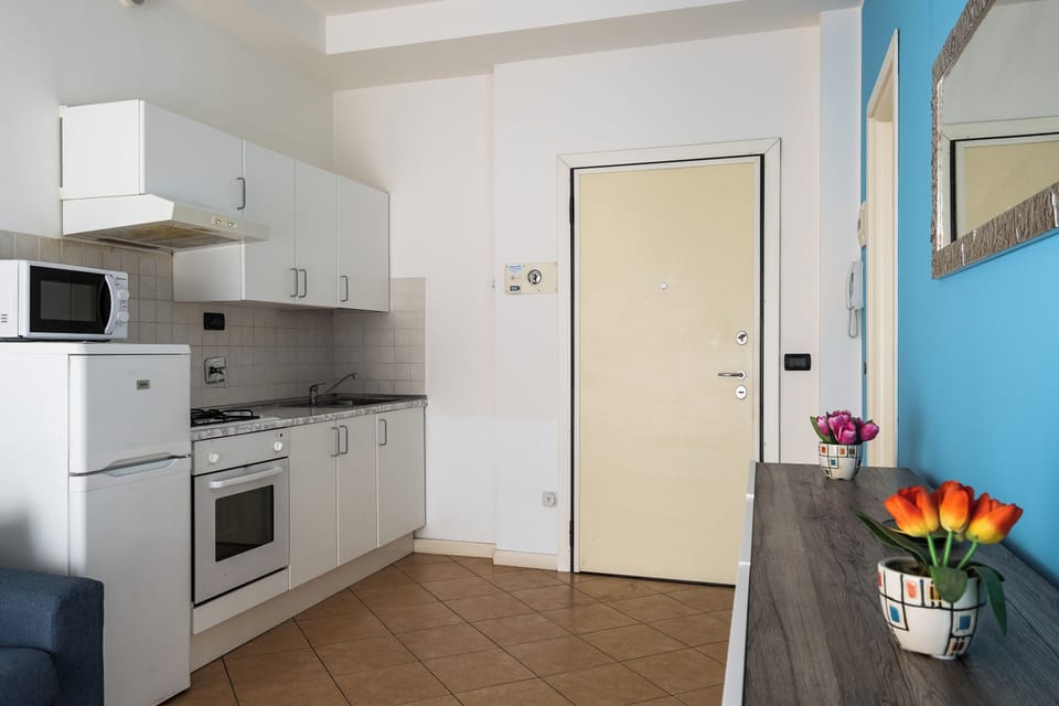 Apartment | Private kitchen | Full-size fridge, microwave, oven, stovetop