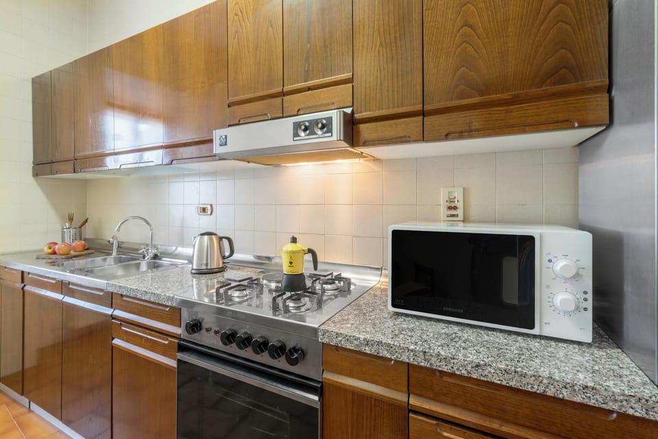 Apartment, City View | Private kitchen | Full-size fridge, microwave, oven, espresso maker