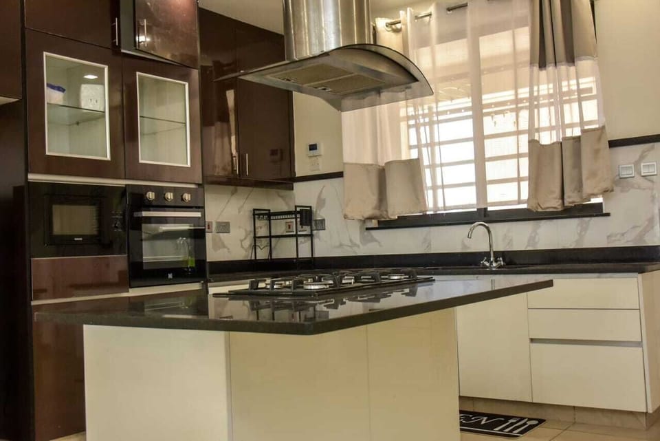 Executive Apartment, Balcony, City View | Private kitchen | Fridge, microwave, cookware/dishes/utensils