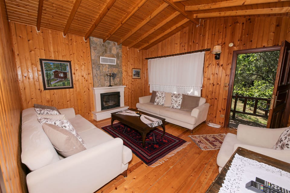 Deluxe Suite, Fireplace, Partial Sea View | Minibar, in-room safe, desk, blackout drapes