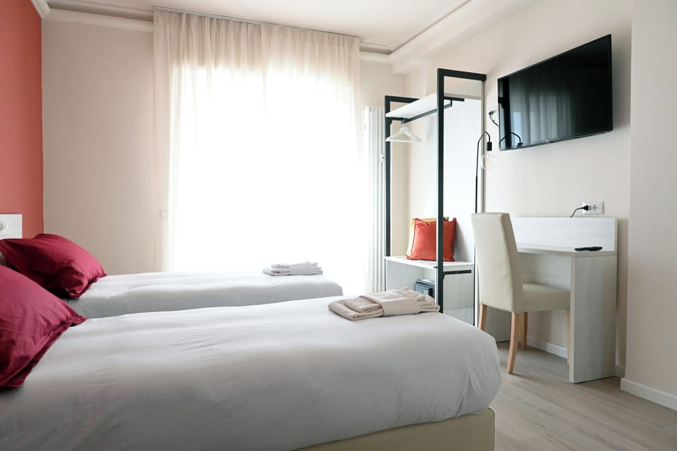 Deluxe Double or Twin Room, Balcony | Premium bedding, down comforters, in-room safe, individually decorated