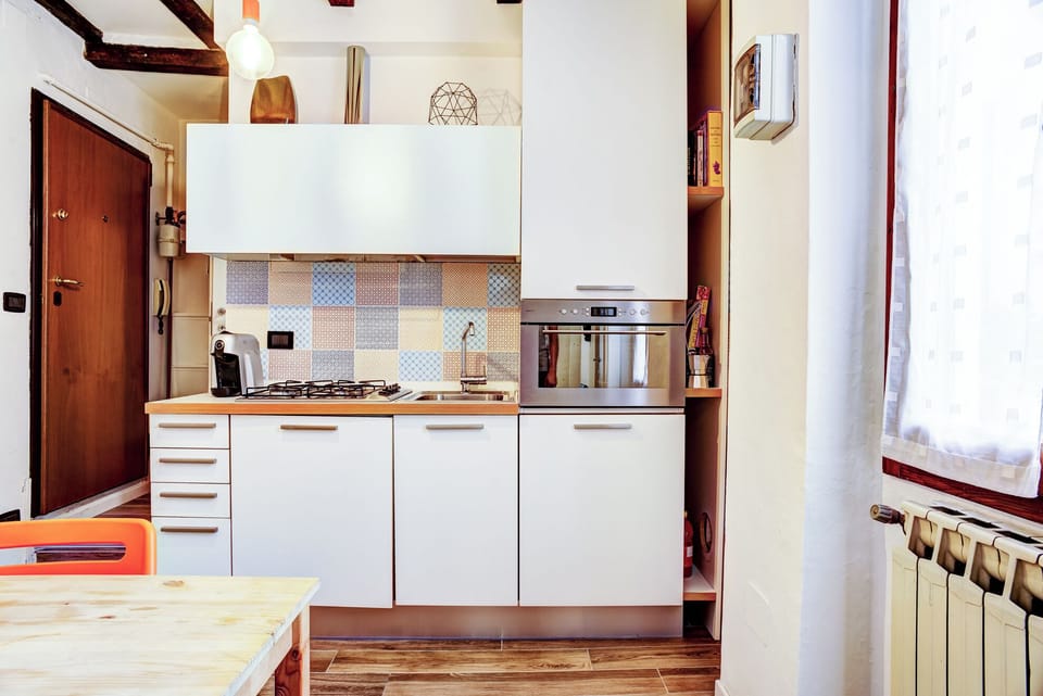 Apartment | Private kitchen | Espresso maker, dining tables