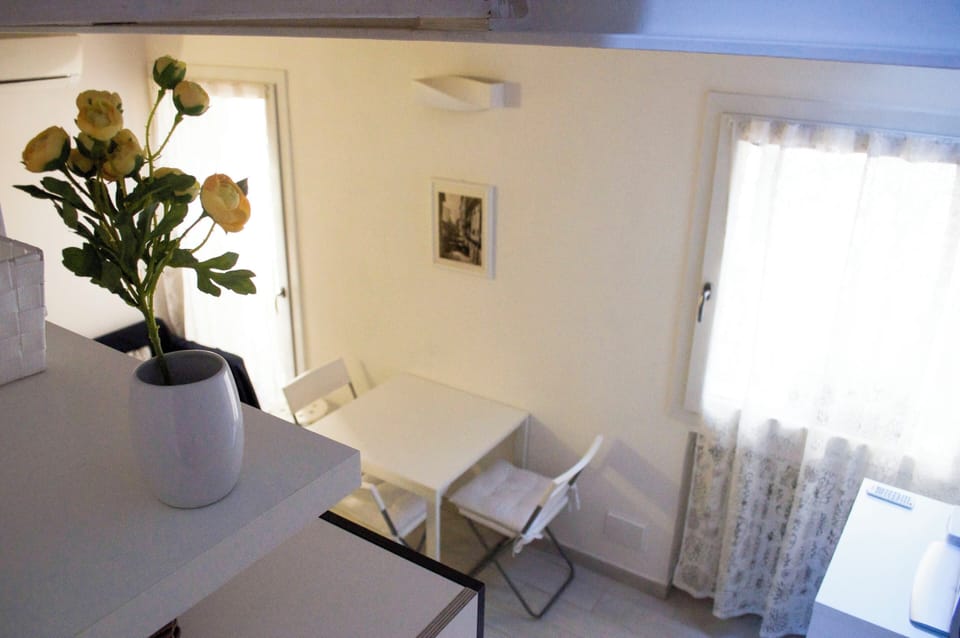 Apartment | Living area | 32-inch flat-screen TV with cable channels