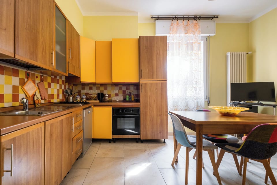 Apartment | Private kitchen | Espresso maker, electric kettle, dining tables