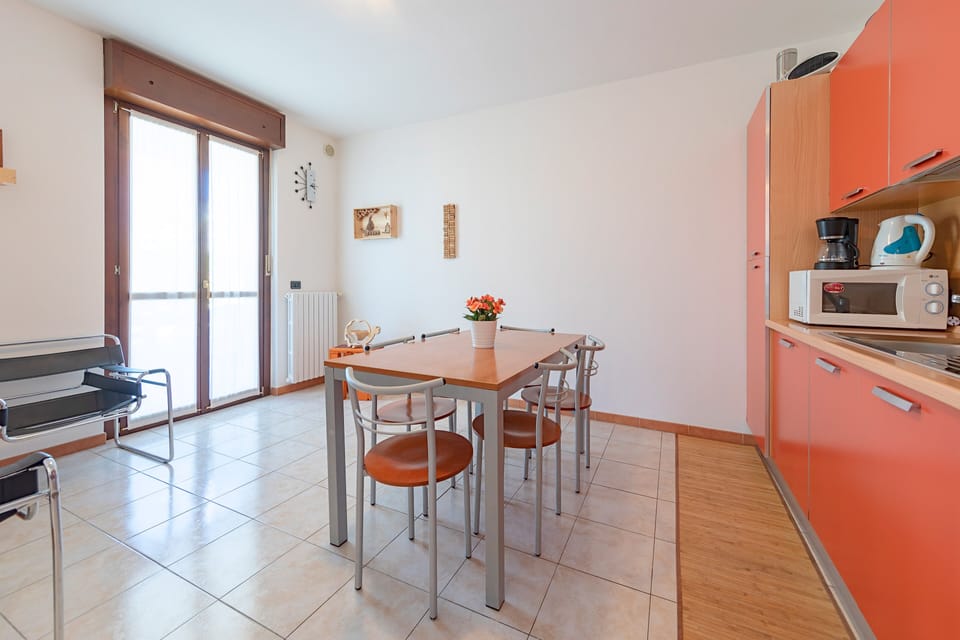 Apartment, Pool View | Private kitchen | Full-size fridge, microwave, oven, dishwasher