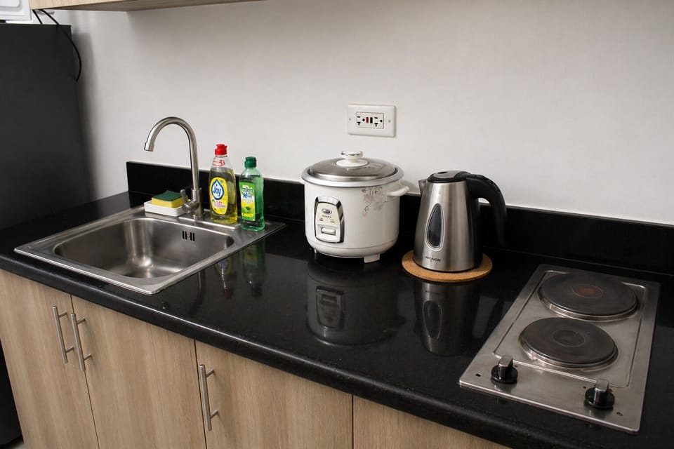 Family Condo, Balcony, City View | Private kitchen | Full-size fridge, microwave, oven, stovetop