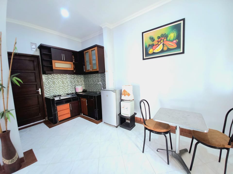 Family House | Private kitchen | Full-size fridge, stovetop, rice cooker, cookware/dishes/utensils