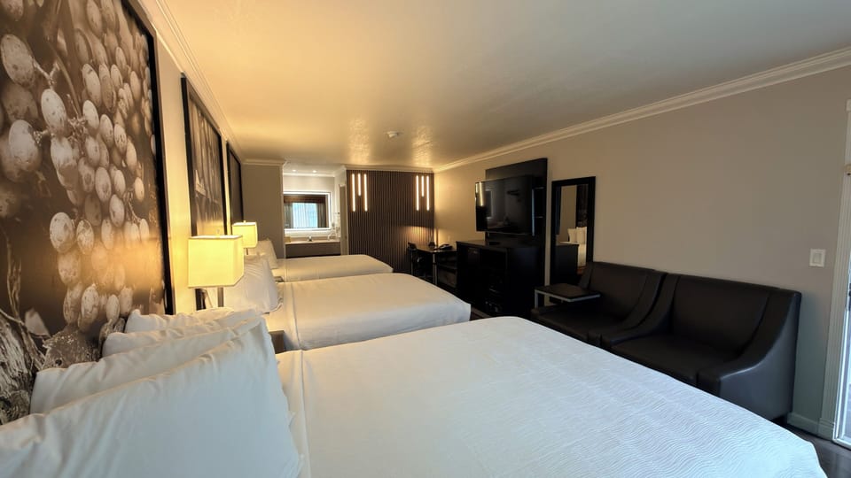 Standard Room, Multiple Beds | Pillowtop beds, in-room safe, desk, laptop workspace