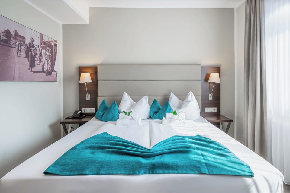 Hypo-allergenic bedding, minibar, in-room safe, desk