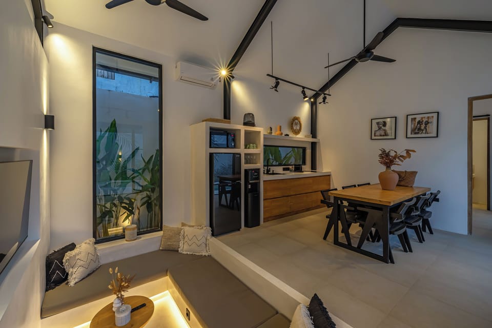 Deluxe Villa, 2 Bedrooms, Patio, Pool View | Living area | 52-inch LED TV with cable channels
