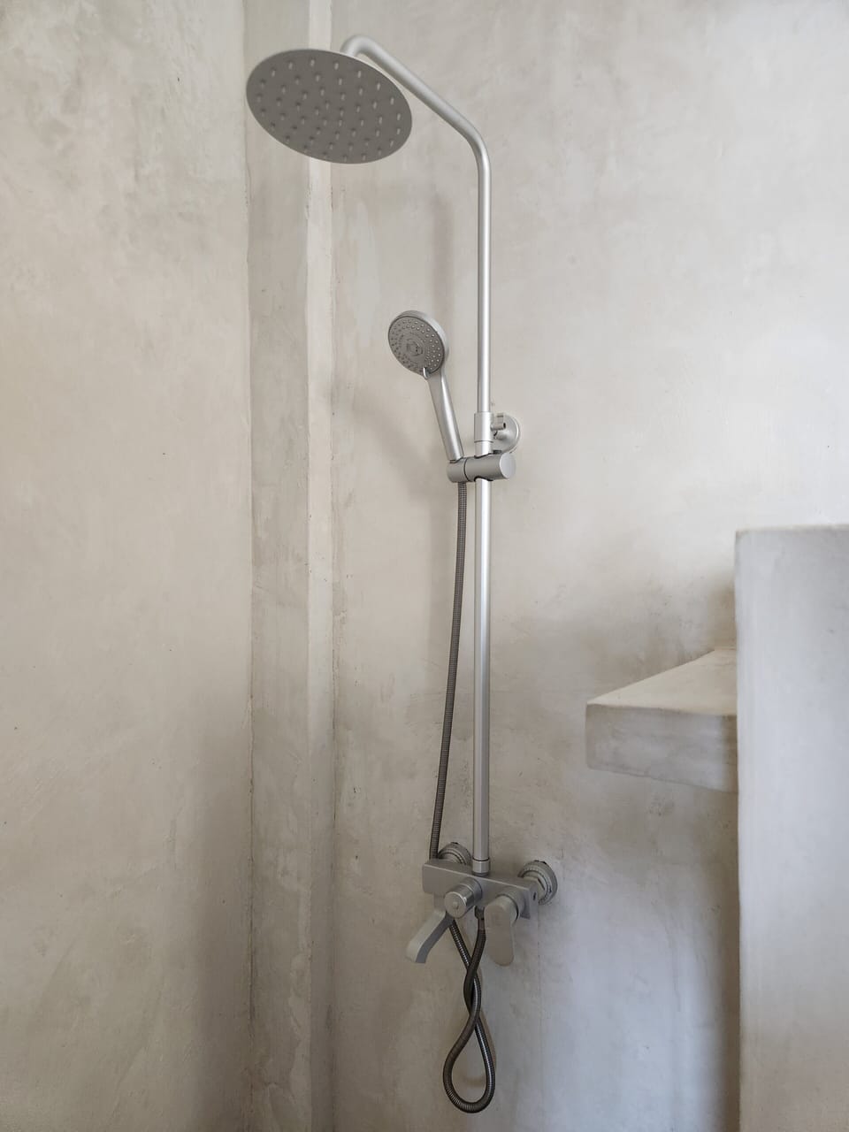 Shower, towels, toilet paper