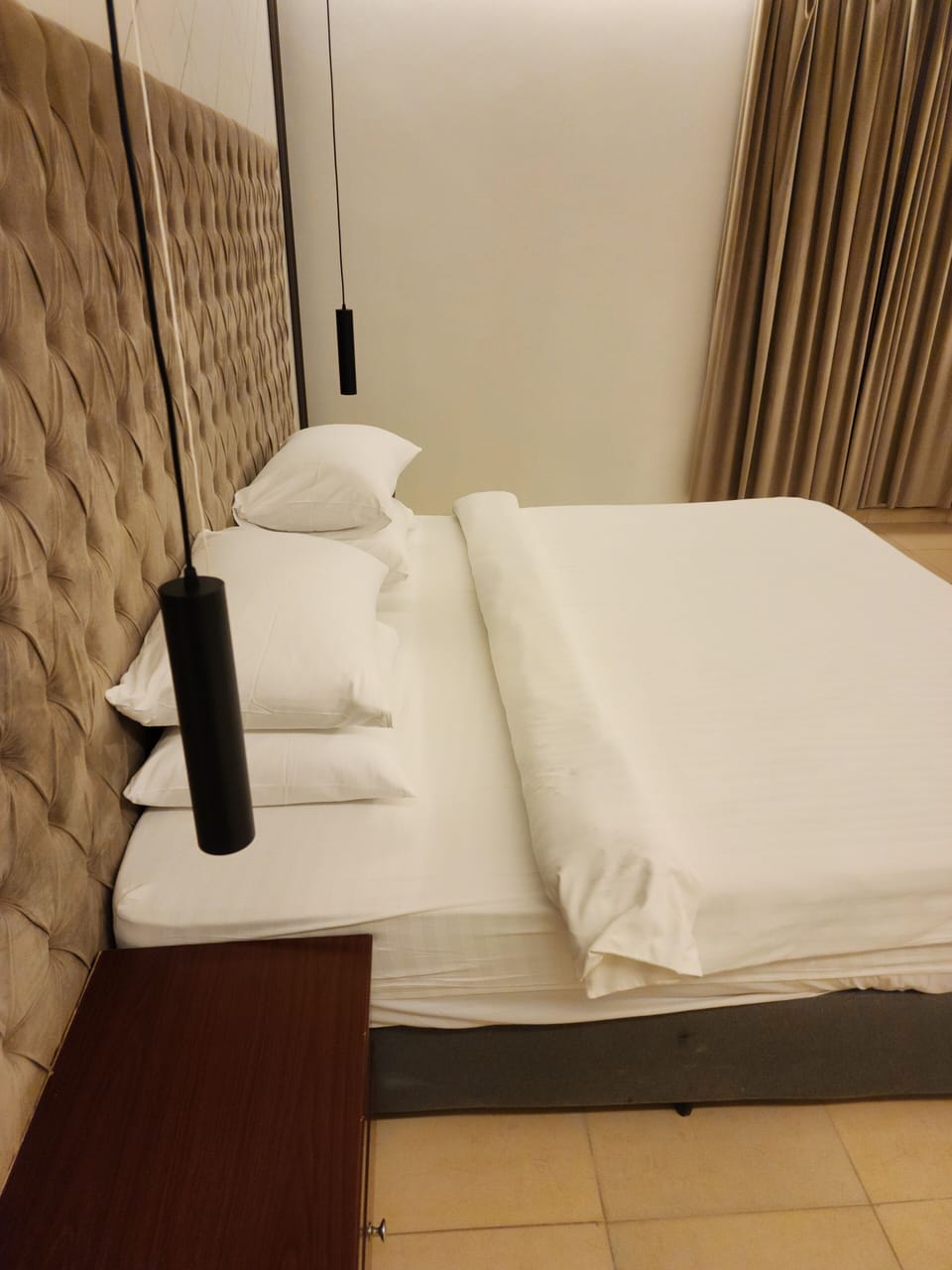 Pillowtop beds, blackout drapes, iron/ironing board, free rollaway beds