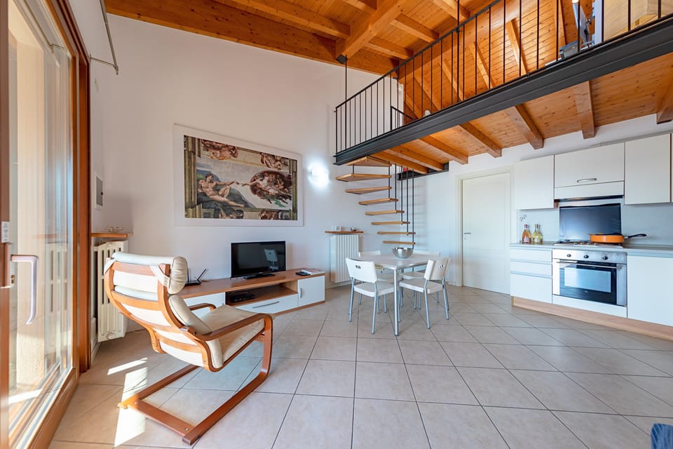 Apartment, Pool View | Living area | 35-cm TV with digital channels