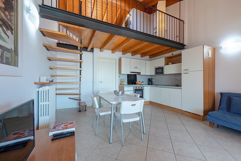 Apartment, Pool View | Living area | 35-cm TV with digital channels