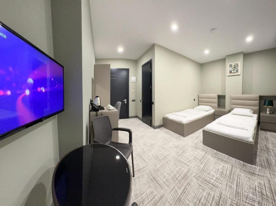 Comfort Twin Room, City View | Minibar, desk, soundproofing, free WiFi