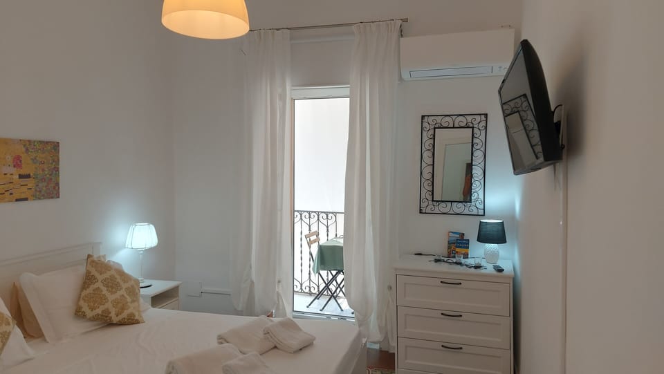 Economy Apartment | 1 bedroom, individually decorated, blackout drapes, iron/ironing board