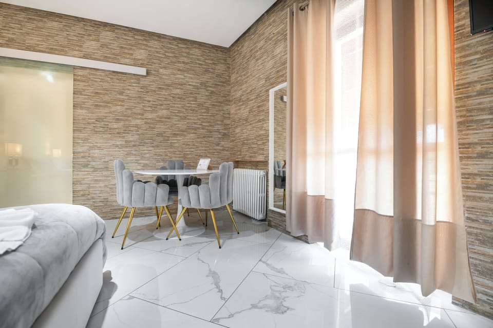Classic Suite, Balcony, River View | Down comforters, minibar, in-room safe, desk