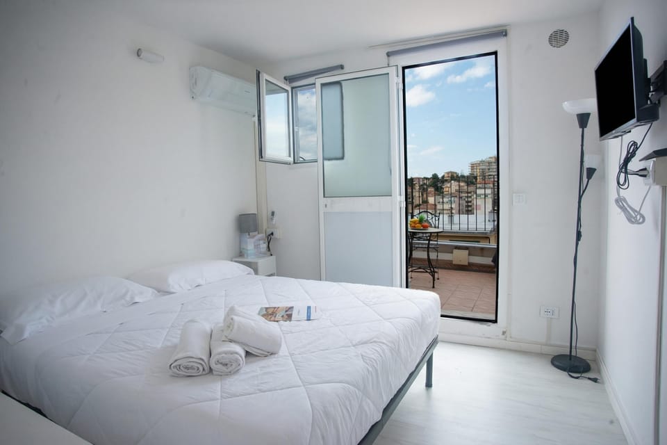 Family Apartment, 1 Bedroom, Microwave (Sea View Historic Center) | 1 bedroom, iron/ironing board, bed sheets