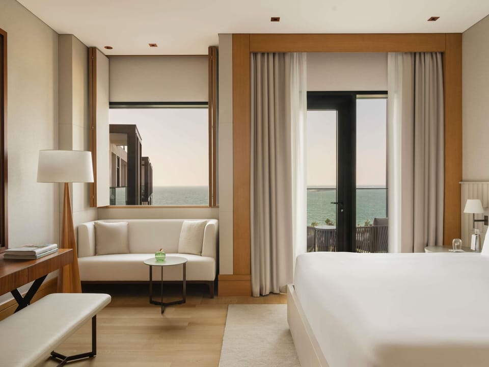 Rising Light Guestroom with Balcony - Sea View | Premium bedding, down comforters, minibar, in-room safe