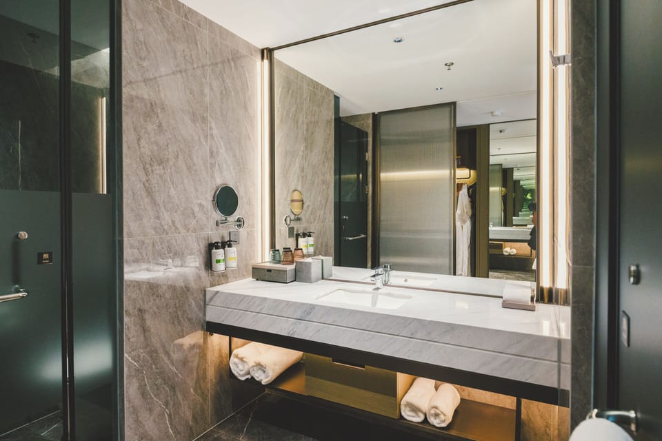 Rainfall showerhead, designer toiletries, hair dryer, bathrobes
