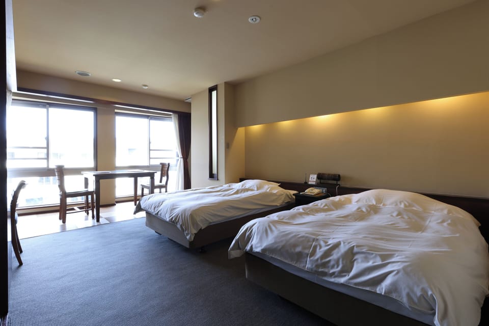 Basic Twin Room, Non Smoking, Sea View | In-room safe, blackout drapes, WiFi (free), bed sheets
