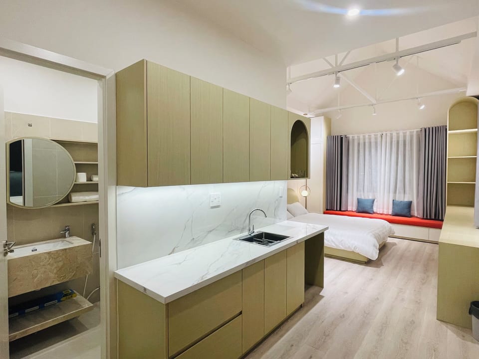 Deluxe Studio Suite | Desk, laptop workspace, blackout drapes, iron/ironing board
