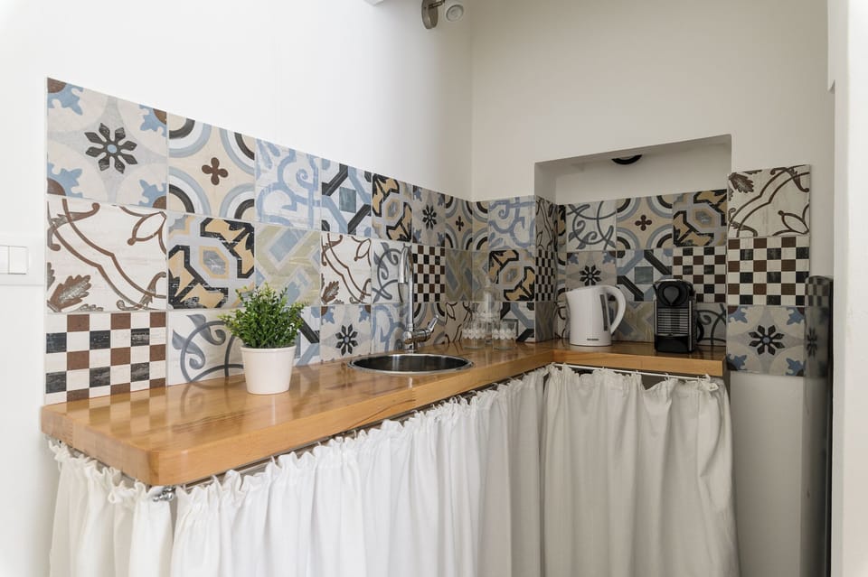 Apartment | Private kitchen | Full-size fridge, stovetop, dishwasher, espresso maker