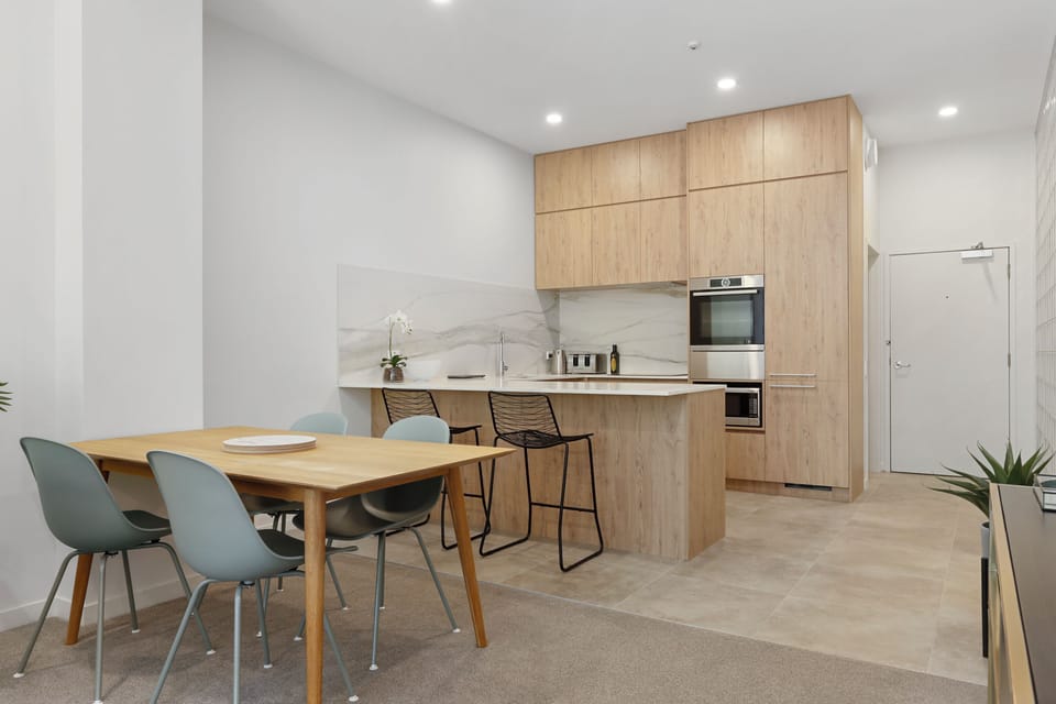 Two Bedroom Apartment with Parking | Private kitchen | Coffee/tea maker, toaster, dining tables